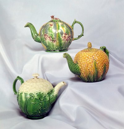 Three Wedgwood colour glazed teapots by English School